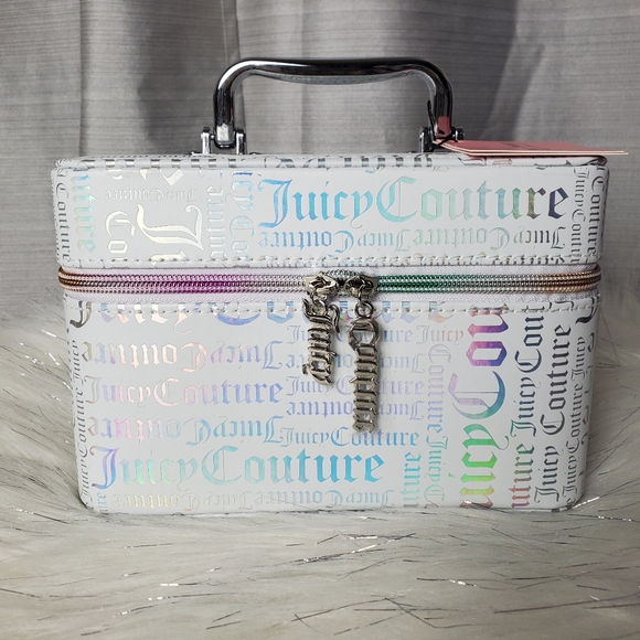 Juicy Couture Handbags - JUICY COUTURE white holographic travel cosmetic bag